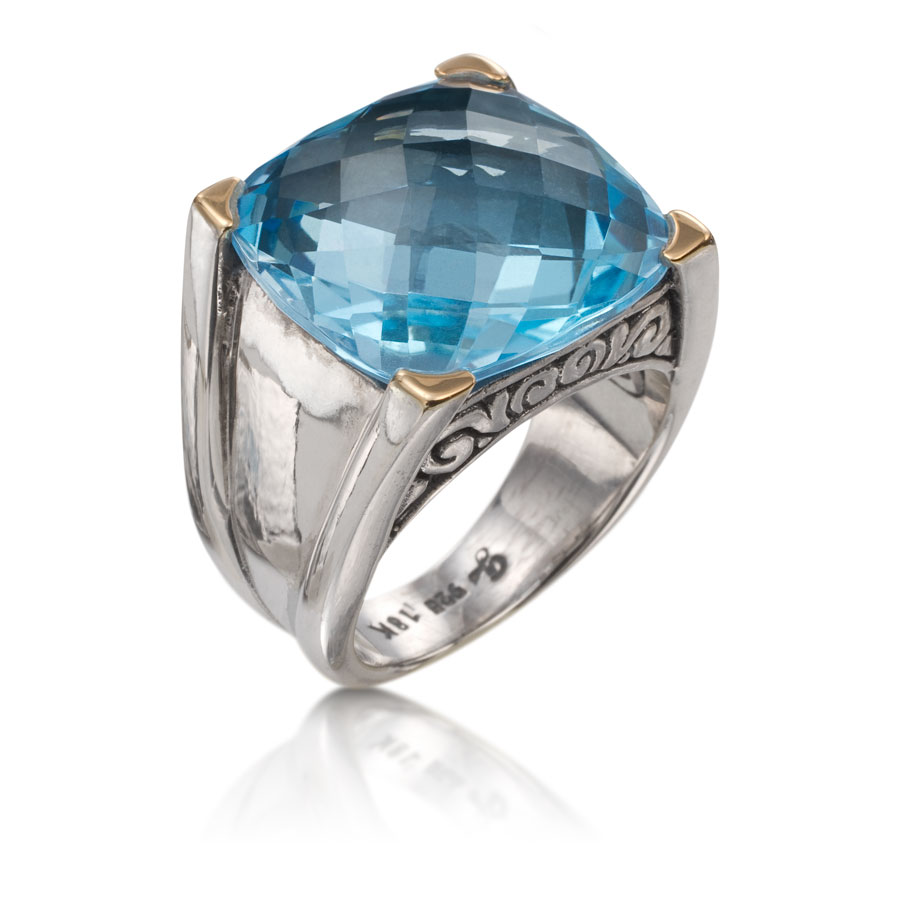 Anillo de plata y oro con topacio azul - imagen 1