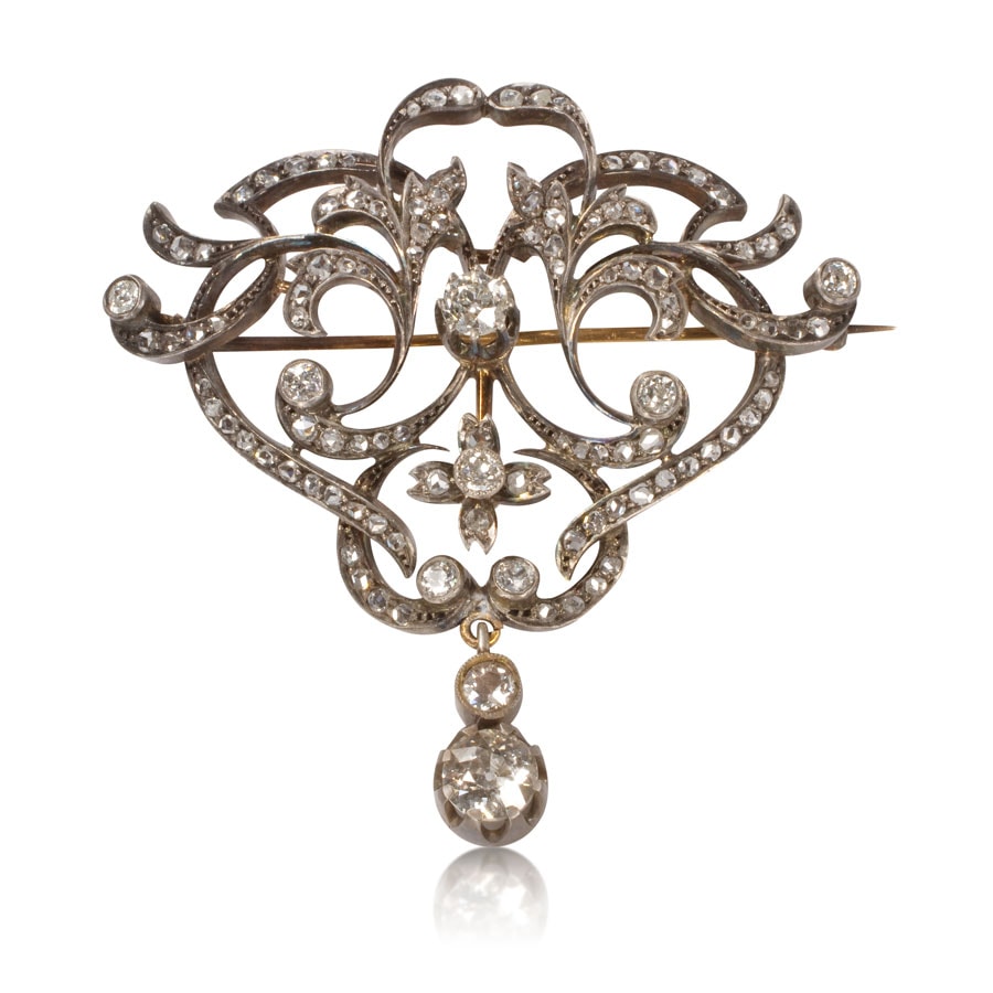 Prendedor de oro y plata con brillantes